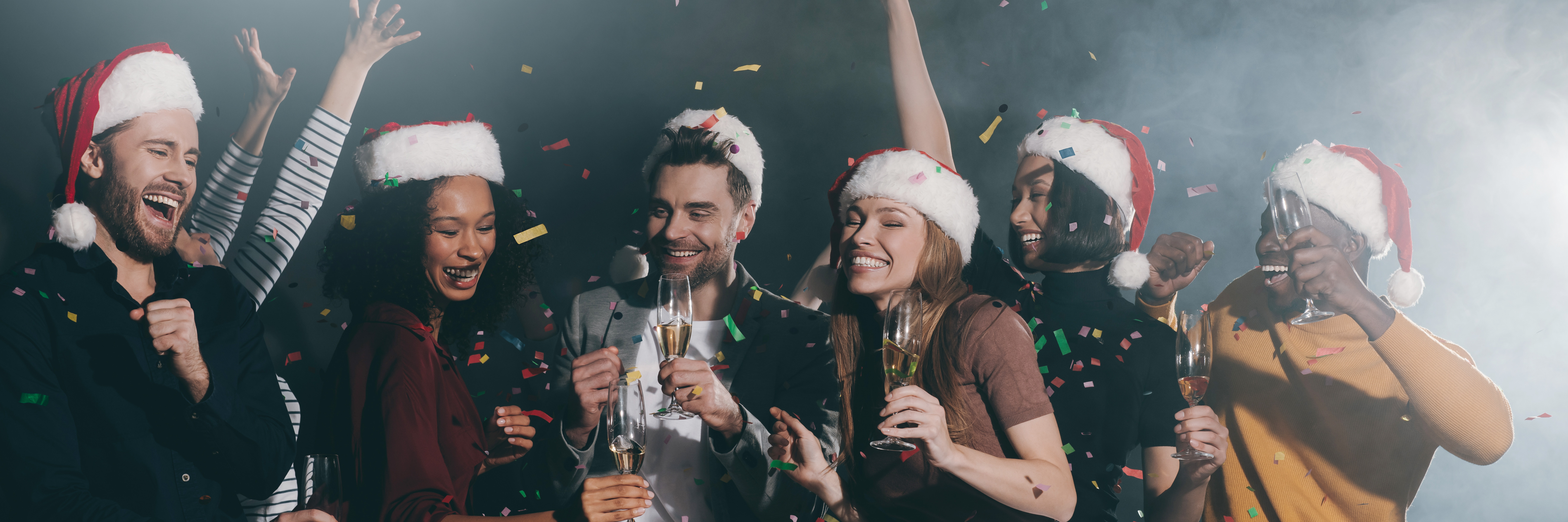 group-young-people-caelebrating-new-year-night-club-together-while-confetti-flying-around